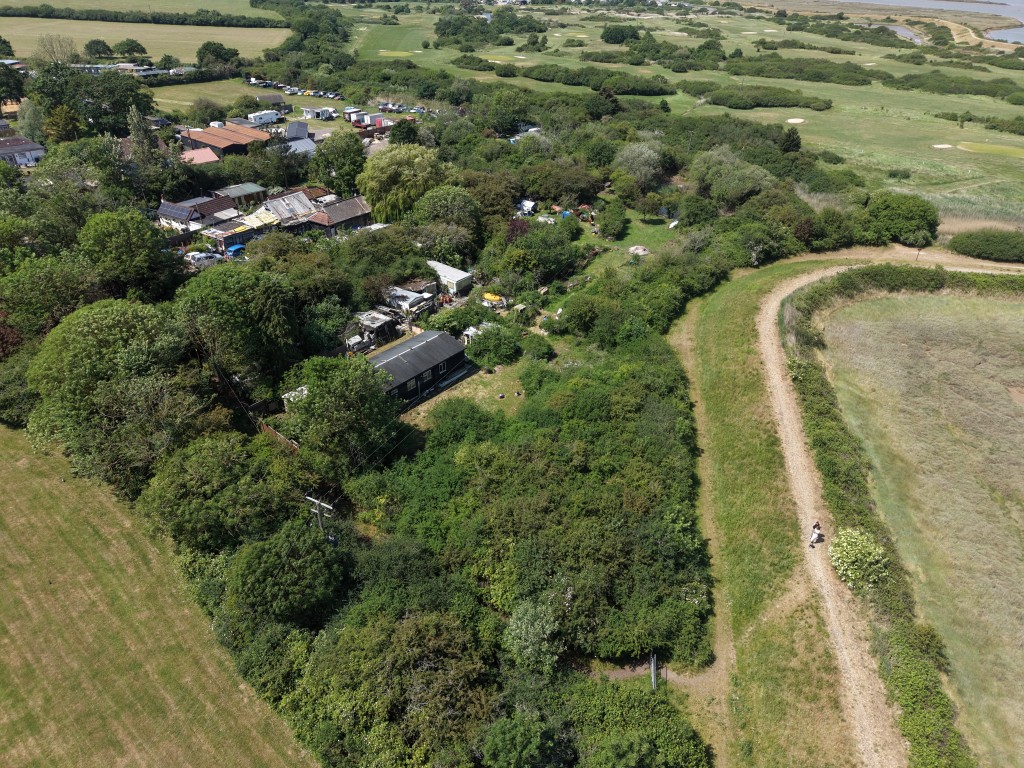 Lot: 82 - 0.88 ACRE FREEHOLD PARCEL OF LAND - 2nd aerial overview of overgrown land